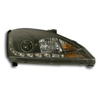 Ford Focus Scheinwerfer 1 Satz (recht/links), Bj. 98-00, Tagfahrlicht Design, Klarglas/Schwarz, Xenon-Optik-Linse, inklusive Blinker, mit LWR (eckiger Stecker)