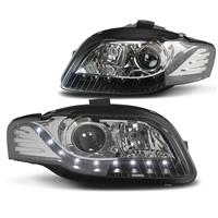 Scheinwerfer in Tagfahrlicht Design f�r Audi A4 B7  Bj. 04-08, Xenon-Optik-Linse mit Doppelfunktion, LWR inkl. Motor, Klarglas / schwarz
